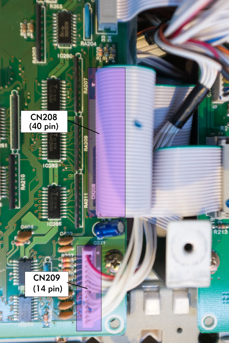 Closeup picture of the SY99 DM2 board, with CN208 and CN209 highlighted.